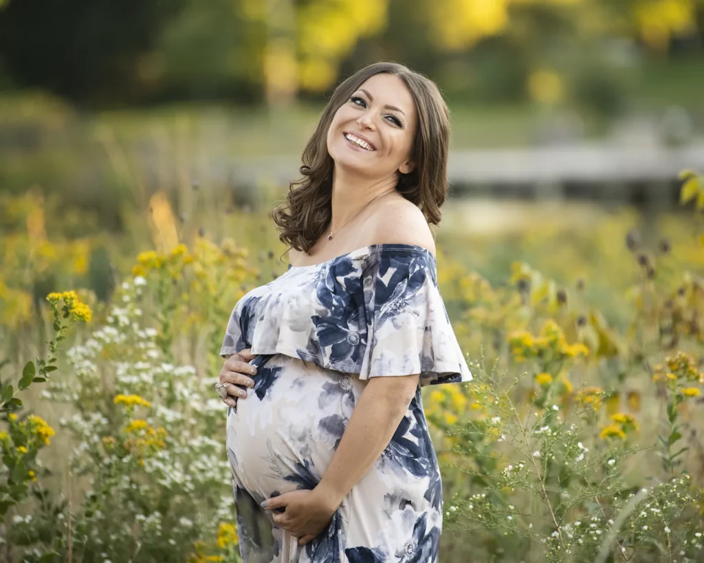 Expectant mother by the lakefront in Glencoe